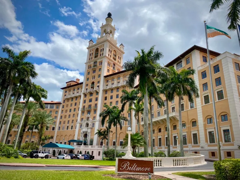 Biltmore Hotel tower (1926) behind palms in Coral Gables, Miami-Dade
