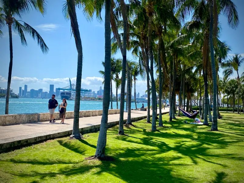 South Pointe Park lawn and baywalk facing Government Cut, PortMiami and the Miami skyline