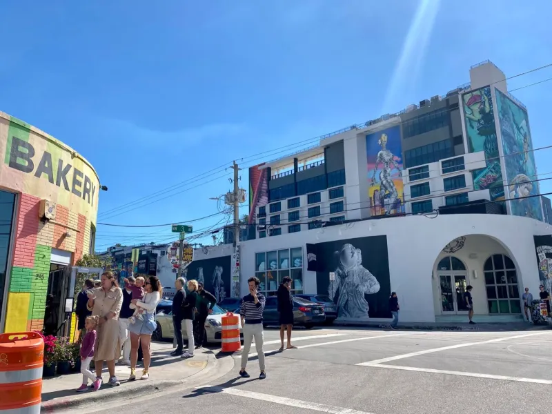 Figure murals on an industrial building facade in Wynwood, Miami