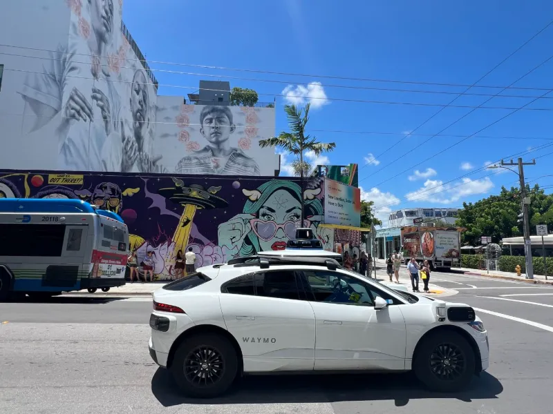 Portrait murals on a building corner in Wynwood, Miami