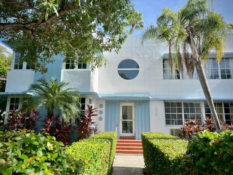 Art Deco apartment entrance with a porthole window in the Art Deco Historic District, Miami Beach