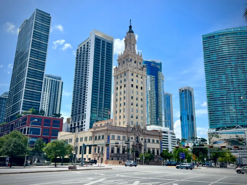 Freedom Tower among Downtown Miami skyscrapers on Biscayne Boulevard
