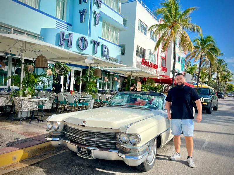 Guide Mikhail with a vintage Cadillac convertible at the Colony Hotel, Ocean Drive, Miami Beach