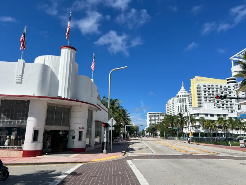 Streamline Moderne building at 1450 Collins Avenue, with the Royal Palm and Loews hotels beyond, Miami Beach